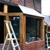 Maçonnerie - Transformation garage en bow window - Pose bois et fenêtres - Pendant travaux